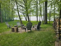 Relax in 3 bed, 2 bath house on quiet 2 acres with private lake.
