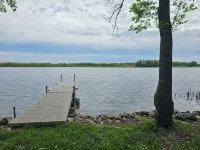 Relax in 3 bed, 2 bath house on quiet 2 acres with private lake.