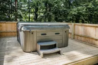 Right Off Main st &Mirror Lake, Olympic Ski Jump View! Fire Pit Hot Tub Foosball - 4-Star