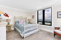 Modern Elegance Meets Coastal Escape: Explore Newly Updated 2 BR Penthouse Condo