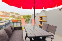 Cozy Vacation Rental in Ponta Delgada - Ideal for Relaxing Getaways Hotels in Arrifes
