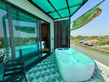 Chainam-Charmchuree Residences Cafe and Spa Отели рядом с достопримечательностью «Wat Molee»