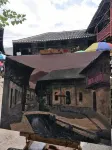 Yueyang Qianyitang Homestay - servizio colazione