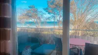 House directly on the beach, behind the dune, sea view