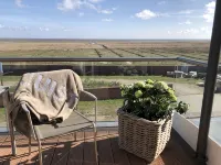 Comfort vacation apartment with south-facing balcony and unique view of the mudflats - 4-Star