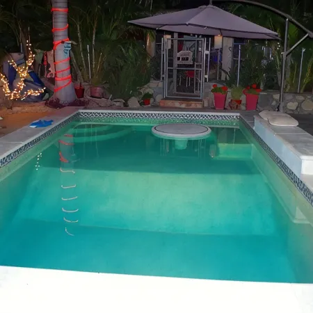 RV on private lot with pool 10 min walk to the beach
