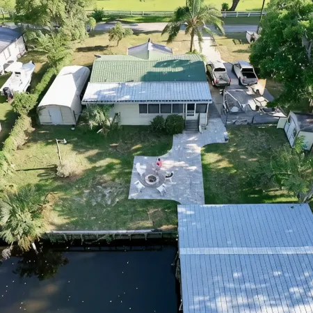 3 BR 2 BA House w/Dock on Deep Canal in Bass Capital