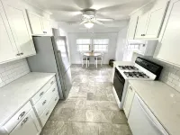 Charming Coastal Cape Cod w/ King Bed, Bikes, & Game Room near Downtown Beach - Wifi