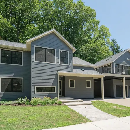 AMAZING NEWER HOME WITH LAKE VIEWS, steps away from shops and restaurants.