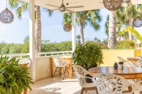 Bayside Boutique Hotel - Blue Bay Golf & Beach Resort - bar