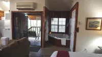 溫泉木屋，適合情侶度假，配有按摩浴缸和熱水浴缸，觀山景！ - 3 星級