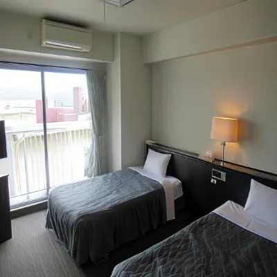 TENNEN ONSEN Tsurusaki Hotel Hotel in zona Nippon Bunri University