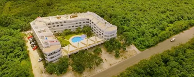 Beautifully Decorated Santorini Inspired Studio Hotels near Cozumel Butterfly & Botanical Gardens