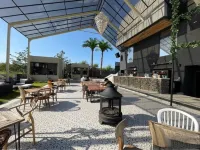 Tan Beach Club & Resort