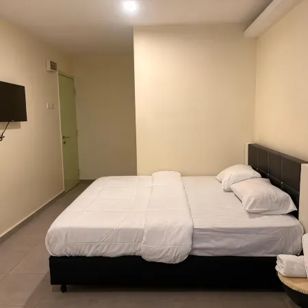 Aman Inn Hotel Отели рядом с достопримечательностью «Автостанция Melaka Sentral»