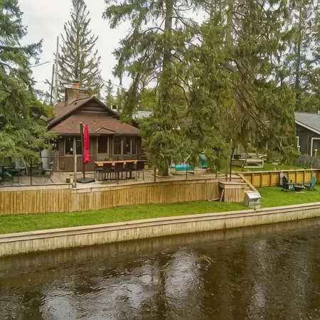 Private River Frontage Cabin! 🌲🚣♂️ Paddle, Float, and Relax to Burt Lake!