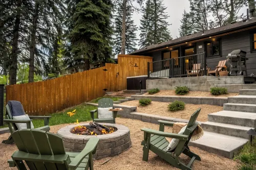 Peaceful Riverside Home: Hot Tub, Fire Pit & Hammock: by Forest & Peak Retreats - Chalets