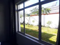 A Cozy Selfcatering Apartment, 5Min dr to the Center and 7Mins to the Rainforest