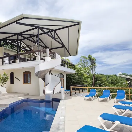 Large Ocean Views with Outdoor Living/Kitchen area, Huge pool w/Slide