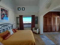 Tranquil setting, sea view, heated pool & Hot Tub, sub-tropical garden. - Ocean View