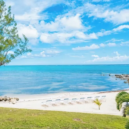 2023 Renovated The Retreat 17 Oceanview ground floor condo steps to ocean/beach