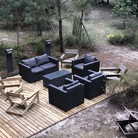 Wooden house in the golf, between forest, lake and ocean