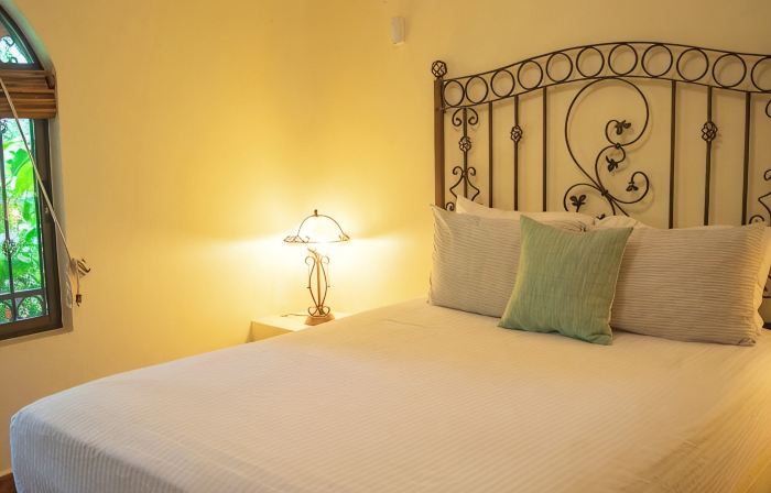 Private suite 102 with beautiful gardens, shared pool and BBQ area!
