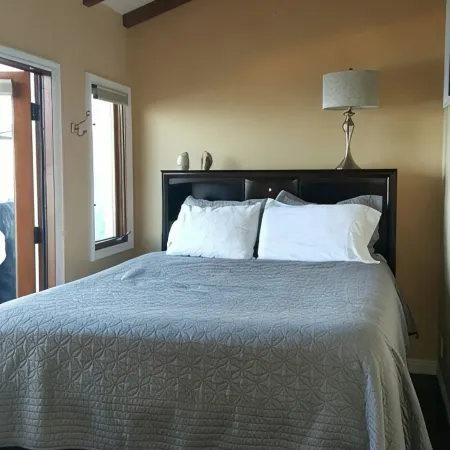MAGNIFICENT OCEAN VIEW Hamilton Cove Condo With Golf Cart Included.