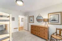 Contemporary Crystal Lake Beachfront Cottage - 4-Star