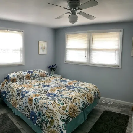 1st Fl of duplex. Sunsets over the bay, walk to beach. Great family getaway.