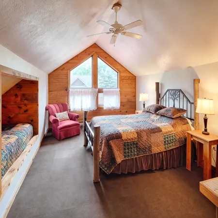 Beautiful spacious country home set on 22 acres that sleeps 27 people.