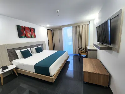 Hotel BE Suites Cali Отели рядом с достопримечательностью «Университет ИСЕСИ»
