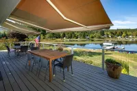 Lakefront Paradise: Private Beach, Water Sports, Stunning Sunsets, Sleeps 8