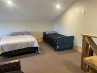 The Pedaler's Rest Retreat - Lakeside Tiny Home for 8 guests Hotels in Rock County