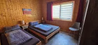 Large wooden house with sauna, in a quiet location by the bathing lake - Alojamientos