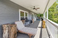 Charming Lakeside Escape w/ Large Deck & Firepit! - 4-Star
