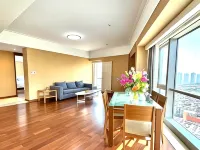 Xiaoxiang Mama Scenic Apartment (Dalian Railway Station Zhongshan Square) Hotel in zona Mori Building