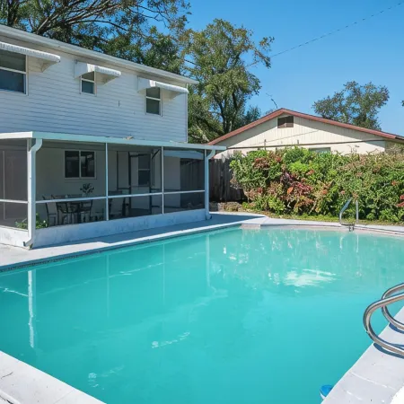 Modern 4-Bedroom Pool House w/ King Beds– 5 Minutes from Downtown!