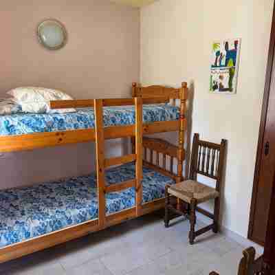 Beautiful house surrounded by an idyllic garden with salt water pool. Rooms