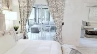 POSHPADZ-Playa Blanca-Walk to Jupiter Beach-Balcony with Seating & Dining Area
