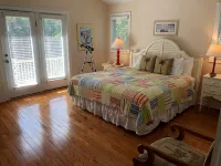 "The Palms" is nestled on a secluded half acre in the forest.  ThePalmsHouse.com - Wifi