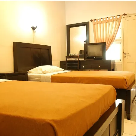 The Abidin Hotel Syari'ah Отели рядом с достопримечательностью «Пляж Air Manis»