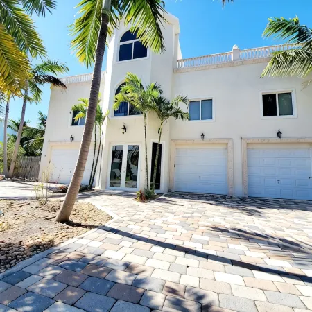 5Br Luxury Home w/ Pool, Theater, Rooftop Deck & 100-ft Dock Near Beach!