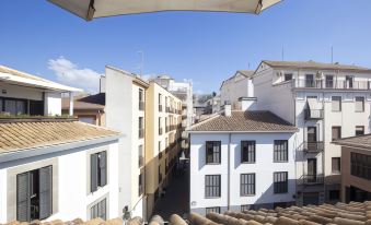 Apartamentos Real Suites Realejo - Housity