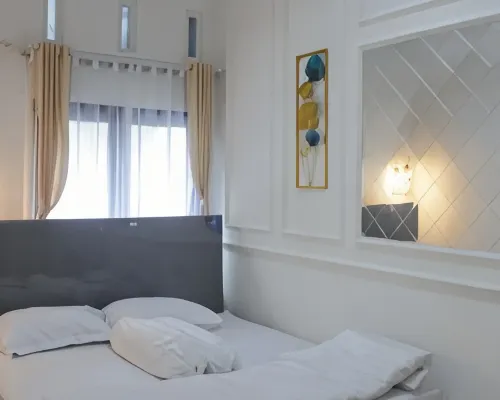 Home Stay Pak Ndan Dekat Masjid Ar-Rahman Hotele w: Kepanjenkidul