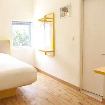 Bloomrooms @ Link Road Отели рядом с достопримечательностью «Стадион «Тхягарай»»