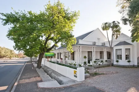 Oakdene Guest House Отели в г. Оудсхорн