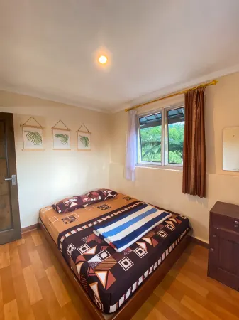 Villa Lembah Ciparay - Clean, Cozy, Family Friendly, with Paddyfield View. Отели в г. Pamijahan