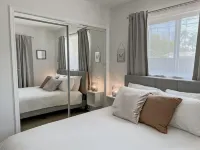 Sunny & Heated Pool Vacation Home, Beach Proximity, Cozy Beds & Wi-Fi