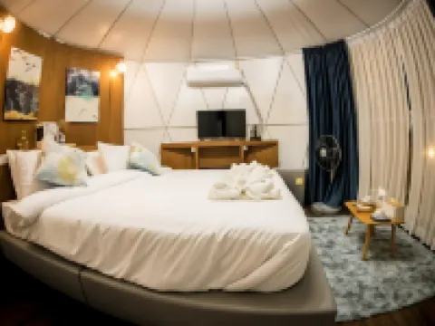 ปาป๊าคิวสวีท รีสอร์ท โรงแรมในร้อยเอ็ด